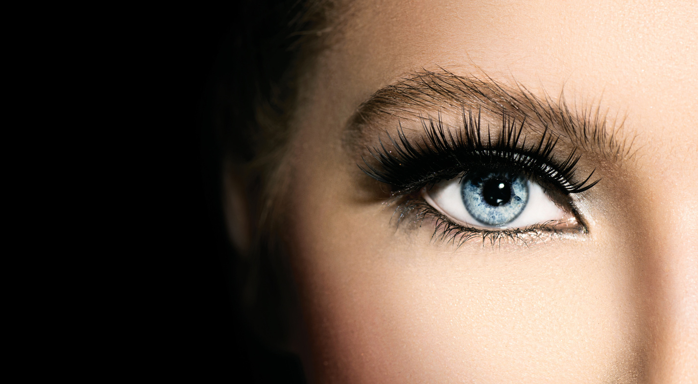 Beauty makeup for blue eyes. Part of beautiful face closeup